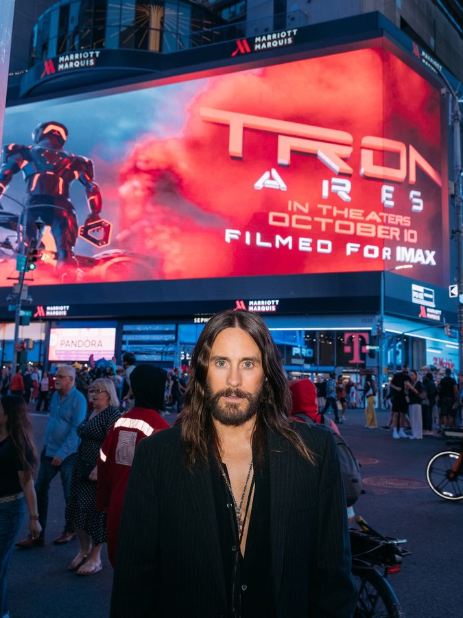 Instagram post by @jaredleto for Walt Disney Studios. Caption reads: From Times Square to the big screen. This is just....