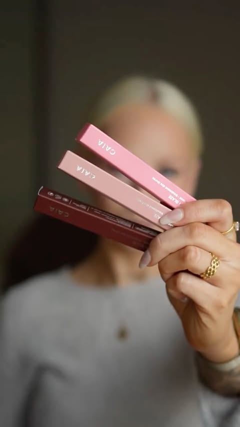 Instagram post by @livannikas for CAIA Cosmetics. Caption reads: In collaboration with @caiacosmetics CAIA /....