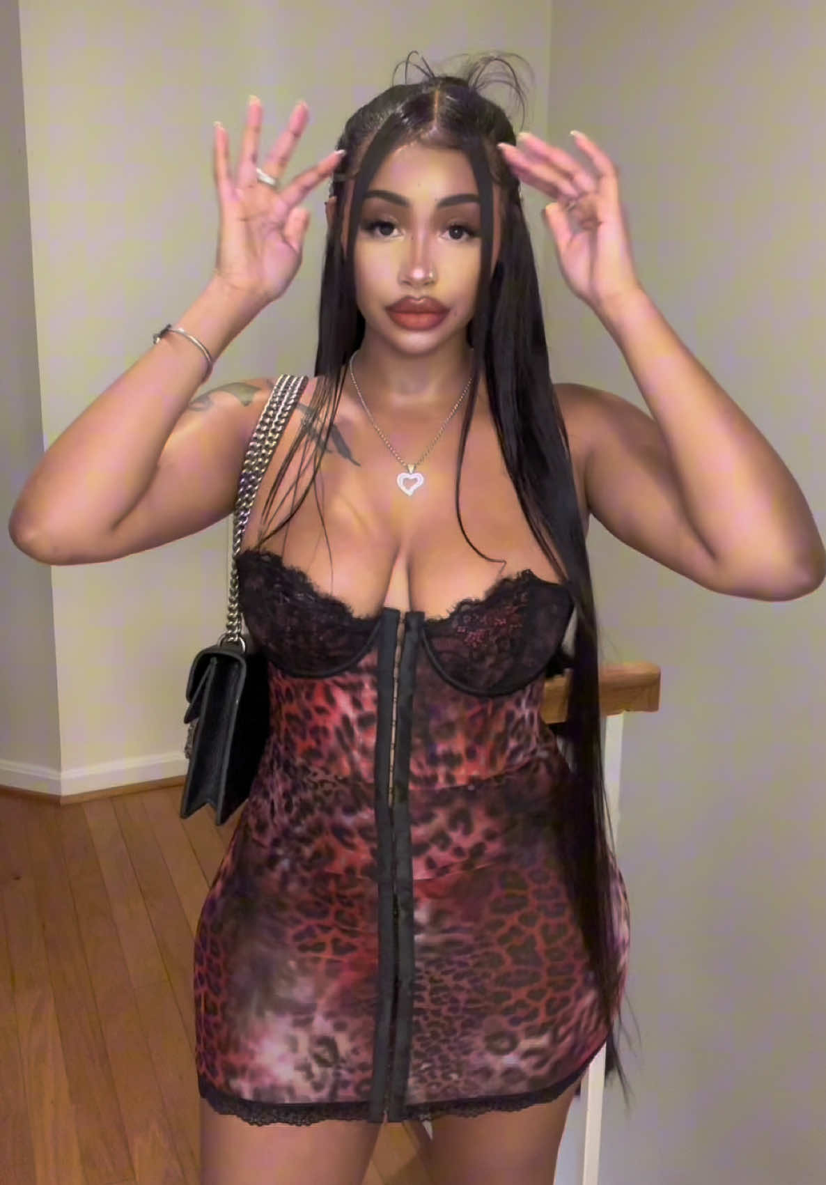 TikTok post by @itsalisparks for Dolls Kill. Caption reads: [...] lil black dress boo🖤🐆💖‼️ @Dolls Kill ....