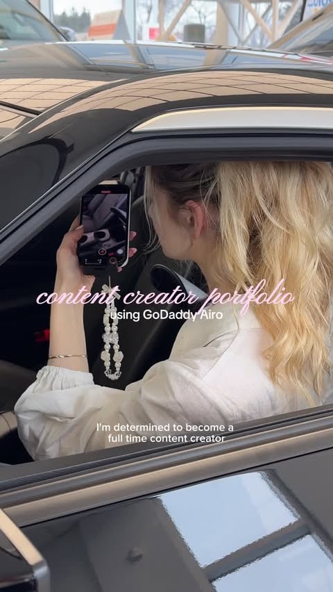 Instagram post by @sarah.oneiill for GoDaddy. Caption reads: [...] my professional website with me using....