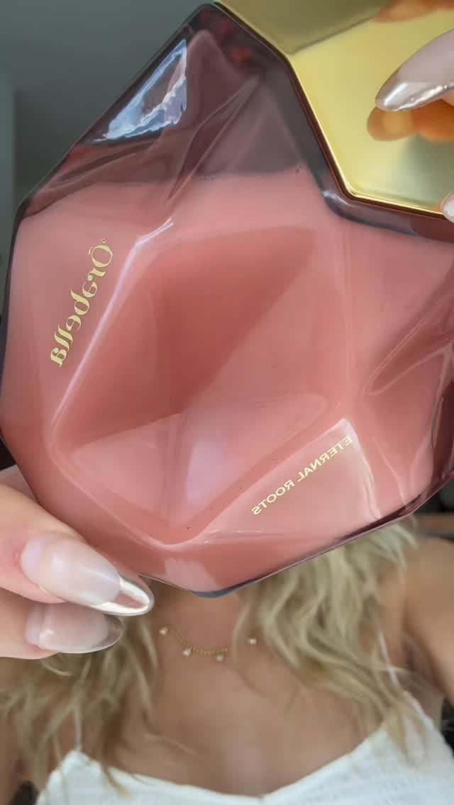 Instagram post by @_sydneypaigebarker for Orebella. Caption reads: She is the moment 🤍 get your @orebella ETERNAL....