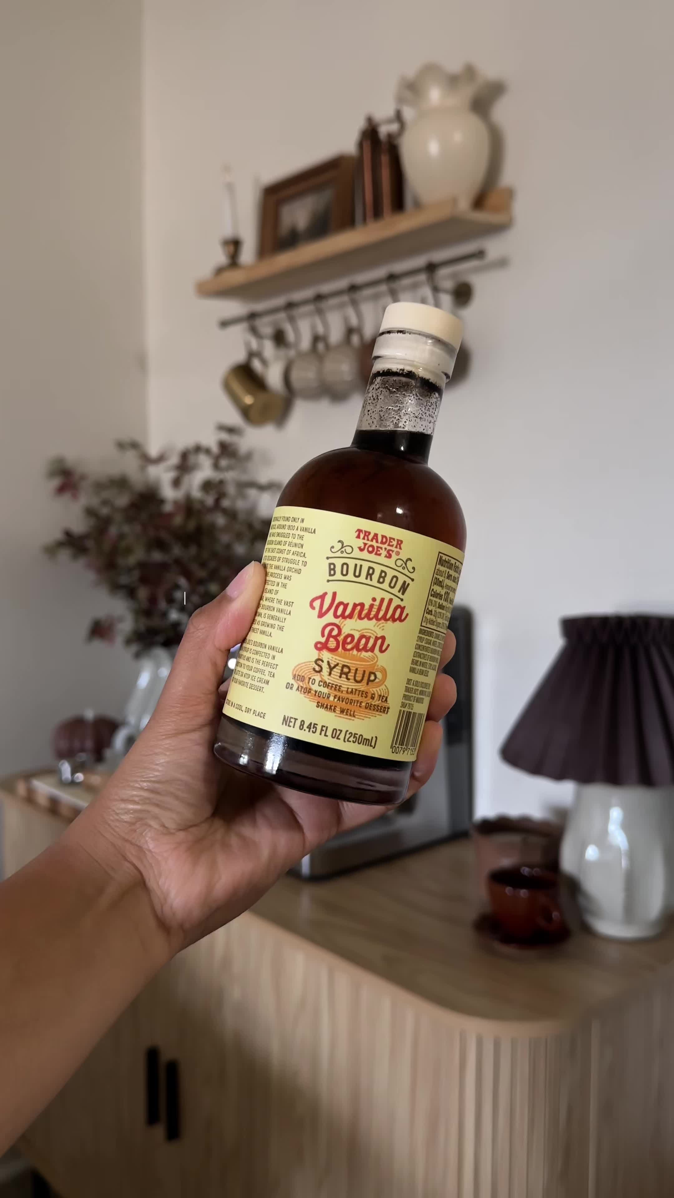 TikTok post by @selenesgv for Trader Joe's. Caption reads: [...] be my new go to 🤍☕️  @TOSSWARE @Trader....