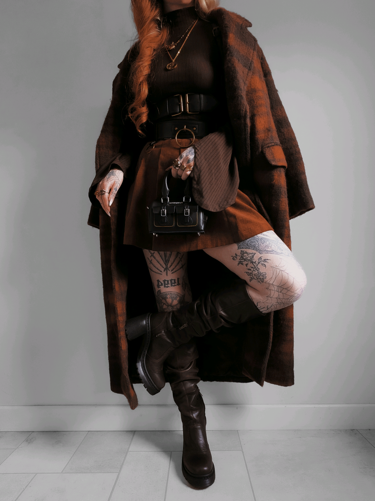 TikTok post by @kllsym for Dr Martens. Caption reads: It's Holiday Season with @Dr. Martens  ❄️ style....