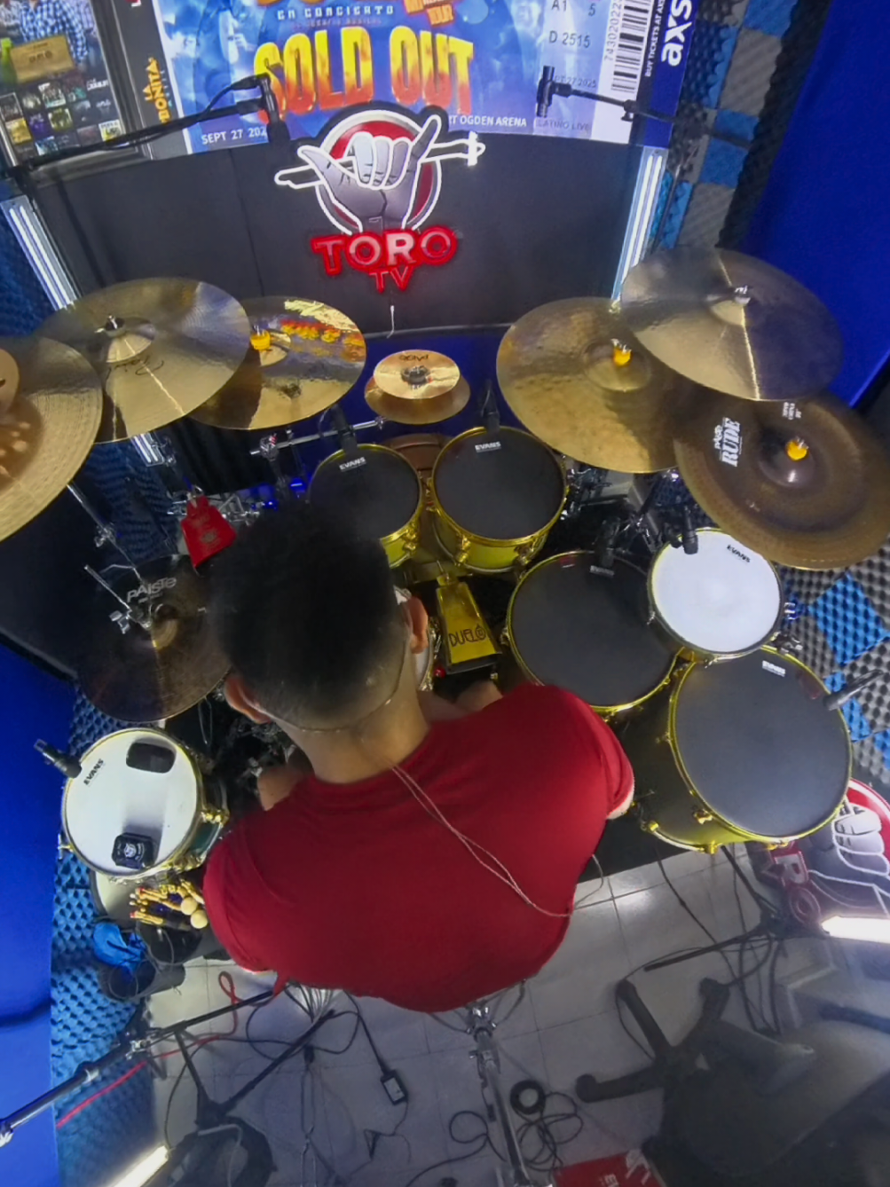 TikTok post by @eltorodelatambora for Sennheiser. Caption reads: [...] Drumheads @Vic Firth @D’Addario @Sennheiser....