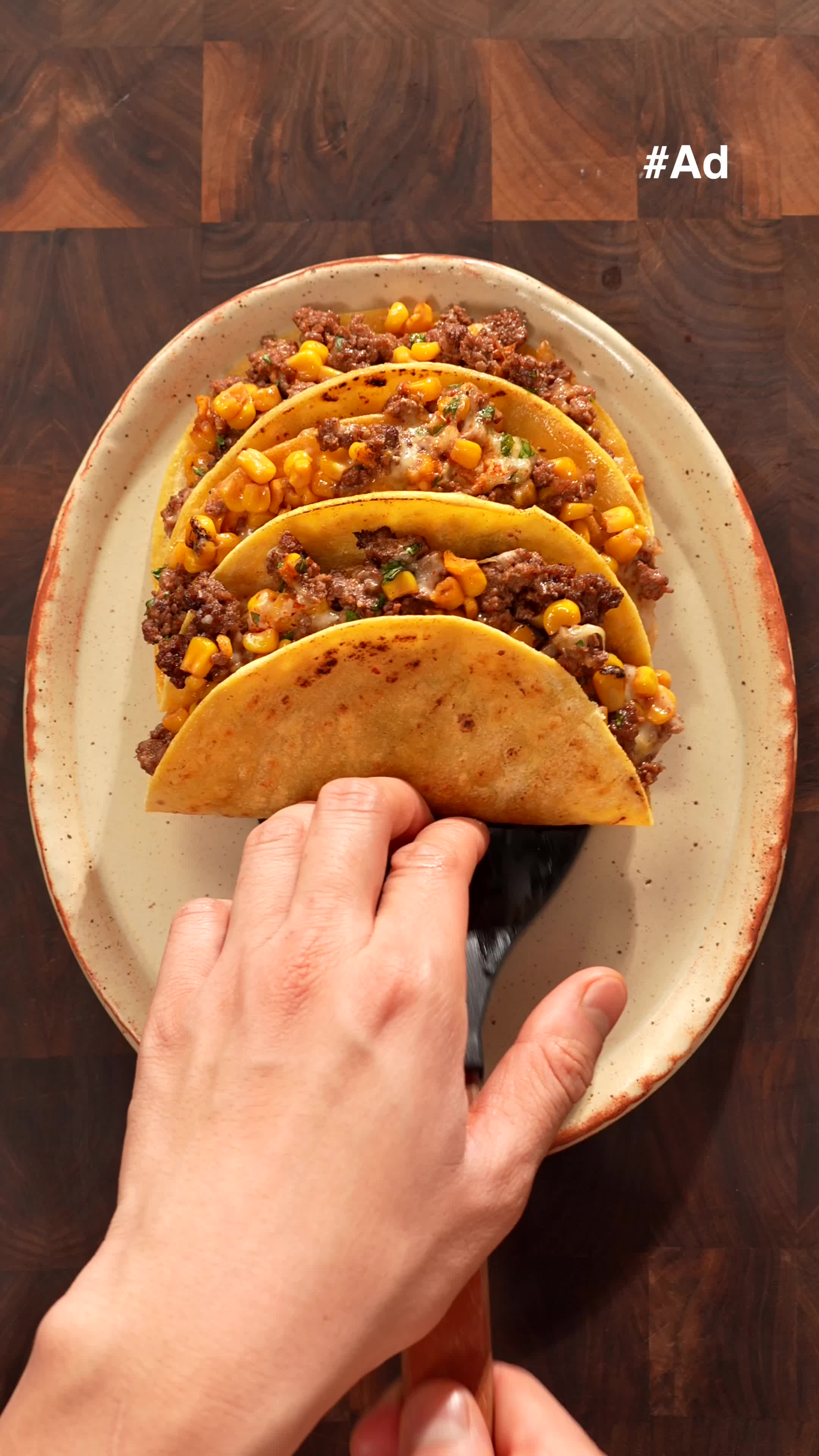 TikTok post by @papabwoi for Del Monte. Caption reads: The most cheesy and corny beef tacos! @Del Monte....