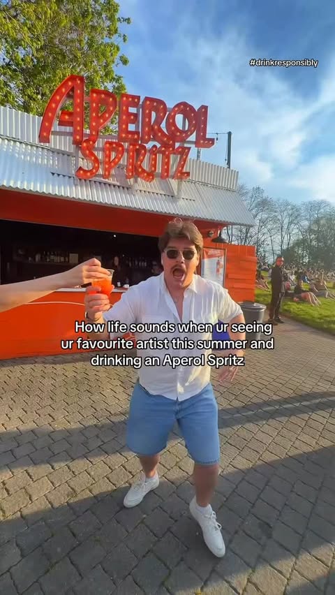 Instagram post by @braeden.obrien for Aperol Spritz. Caption reads: Outdoor concert and an Aperol Spritz....