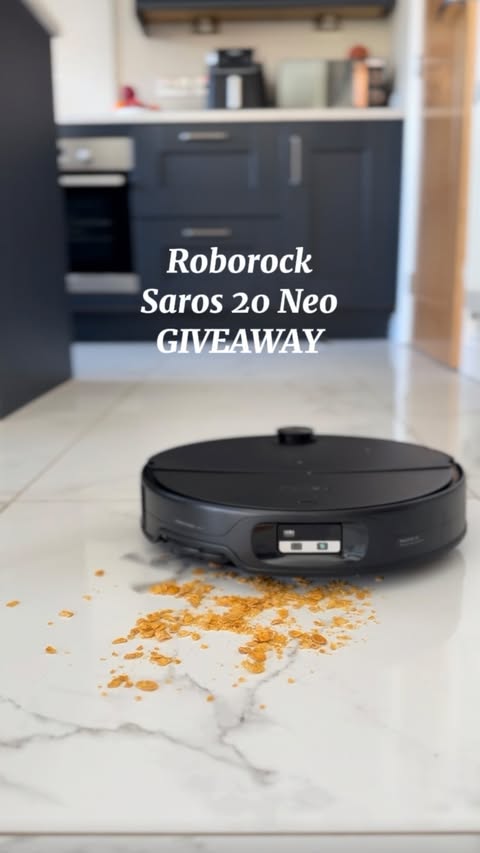Instagram post by @homebyjodie_ for Roborock. Caption reads: Roborock GIVEAWAY! ✨ With white floor tiles I....