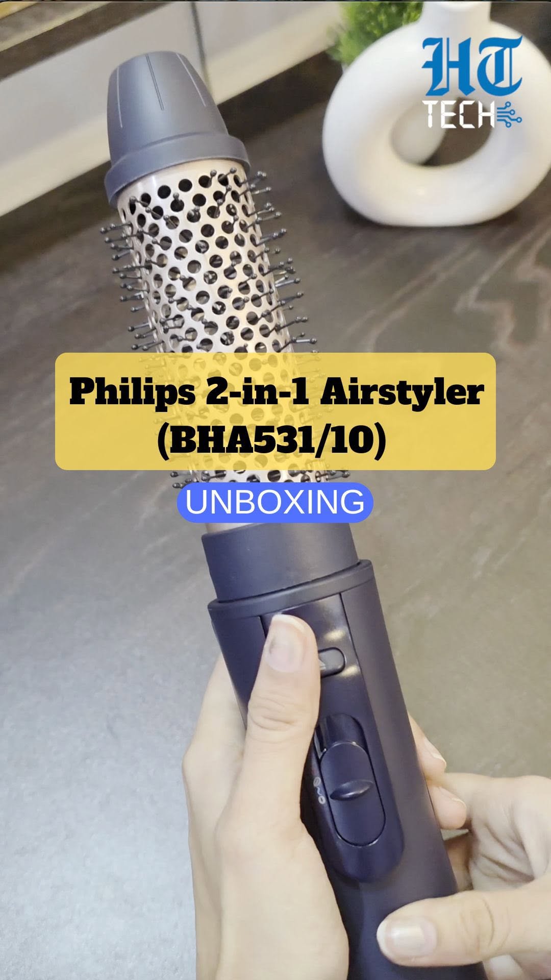 Instagram post by @hindustantimestech for Philips News. Caption reads: #Watch | The Philips 2-in-1 Airstyler (BHA531/10)....