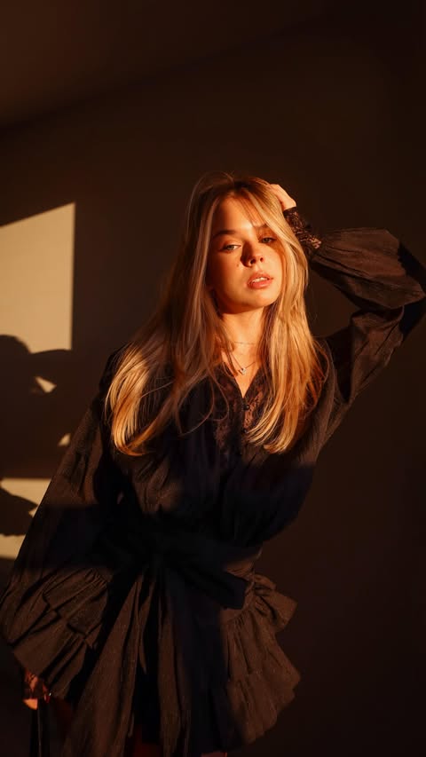 Instagram post by @janulaivanova for Mew Mews. Caption reads: [...] for the holiday season✨
.
🖤Dress from....