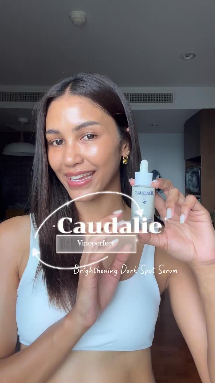 Instagram post by @praewwanichh for Caudalie. Caption reads: Fewer spots, more glow. Not overnight—but worth....