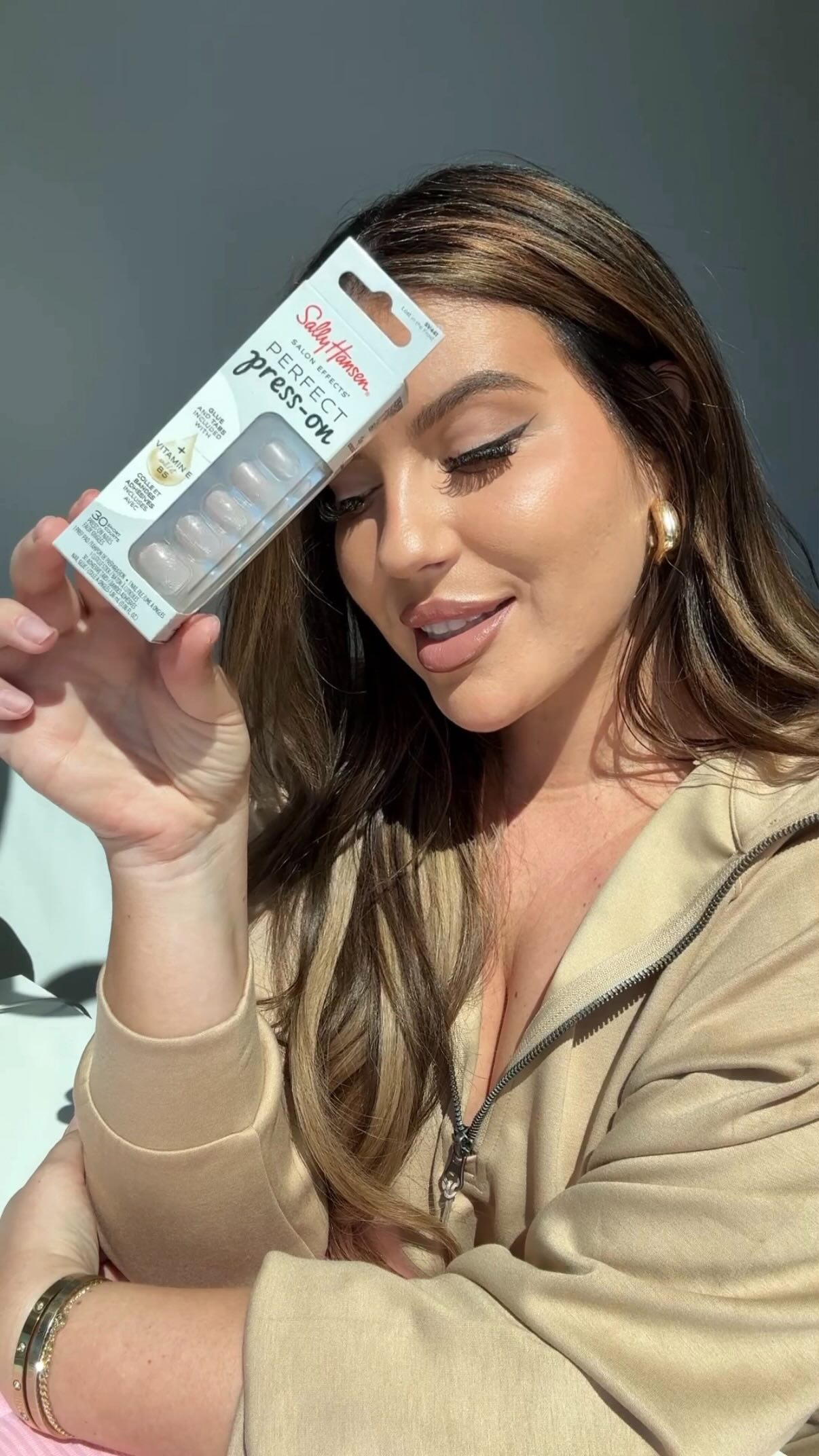 Instagram post by @lizthul for Sally Hansen. Caption reads: Pressed for time, but not for nails!!🙌🏼....