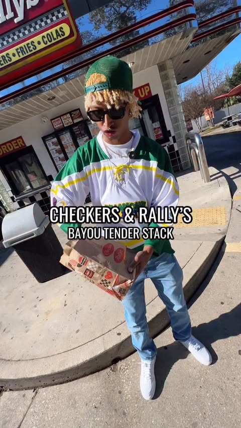Instagram post by @krazyblondeboy_ for Checkers & Rally’s. Caption reads: [...] stacks go good with Mardi Gras....