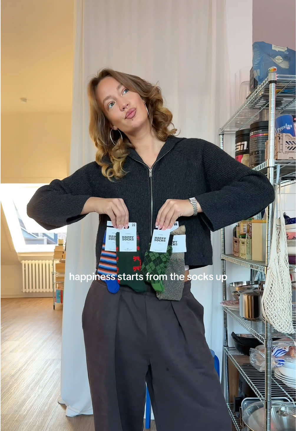 TikTok post by @e1isabethng for Happy Socks. Caption reads: [...] socks up with the original sock icons @Happy....