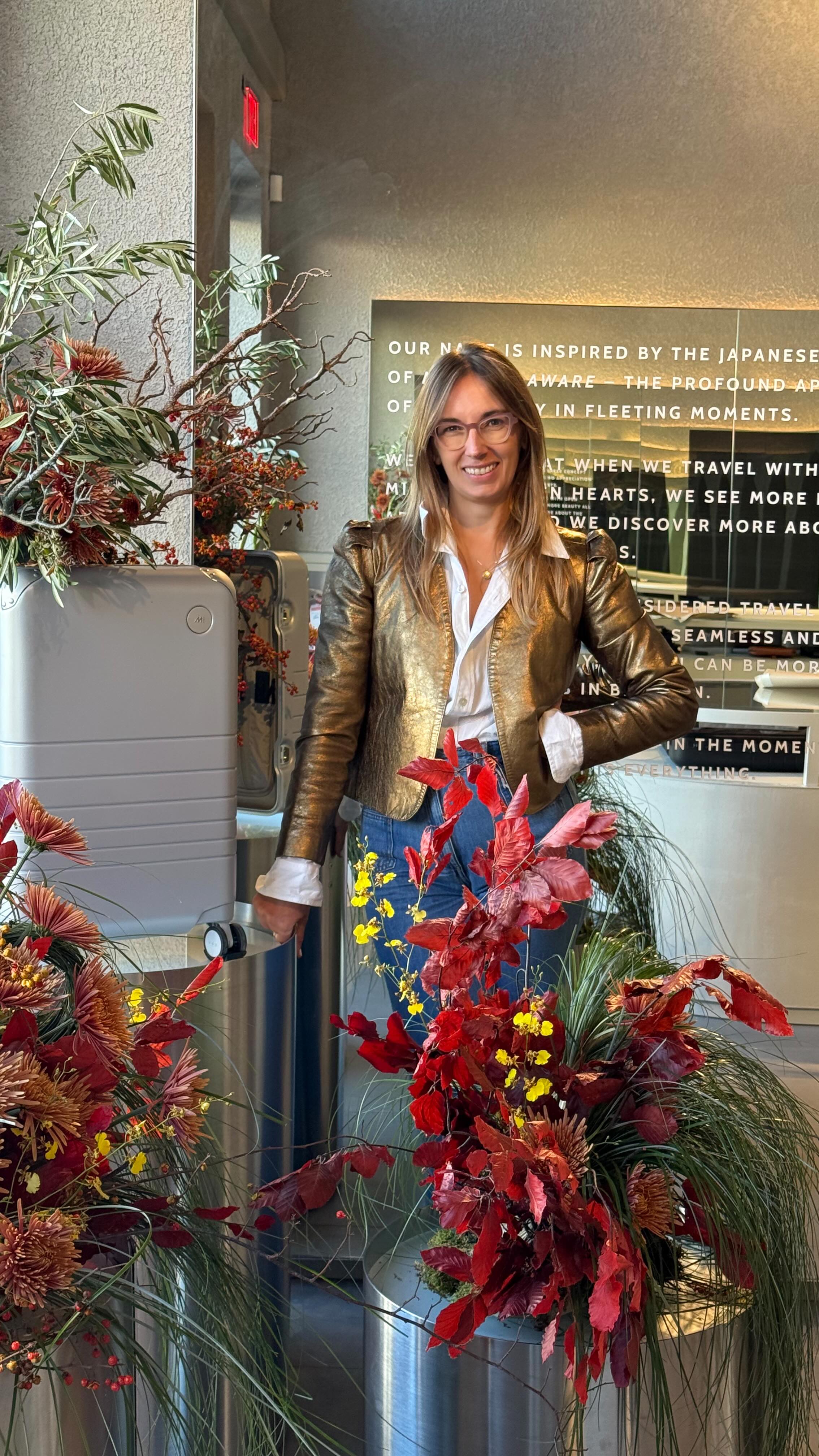 Instagram post by @shelovesmedc for Monos. Caption reads: @shelovesmedc reflects on her floral installation....