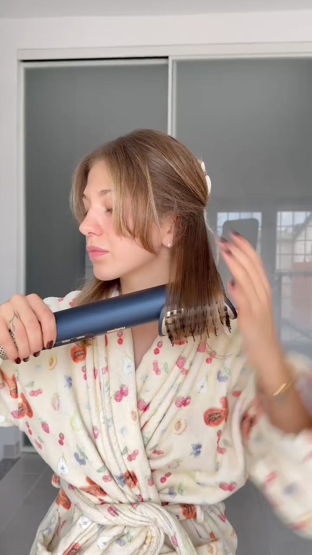 Instagram post by @emmaasartini for BaByliss. Caption reads: Alzi la mano chi non ha mai iniziato la giornata....
