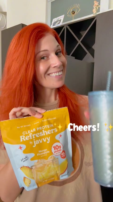 Instagram post by @punkrawkmom44 for Javvy Coffee. Caption reads: @javvycoffee Refreshers are officially part of my....