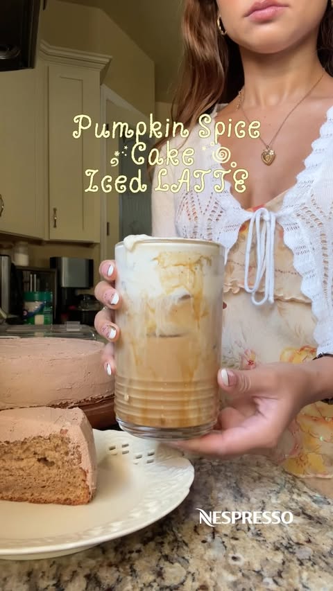 Instagram post by @belajuliana_ for Nespresso. Caption reads: [...] cake on repeat all fall @nespressousa #Ad....