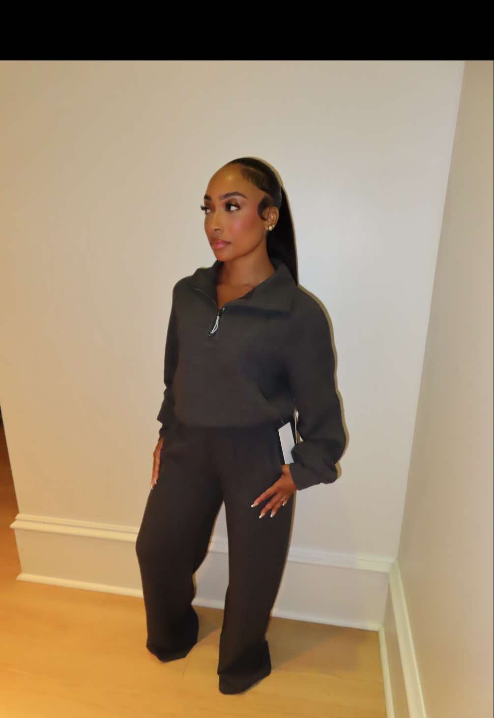 TikTok post by @shi_millz for lululemon. Caption reads: @lululemon - Scuba Cropped Funnel-Neck Half Zip &....
