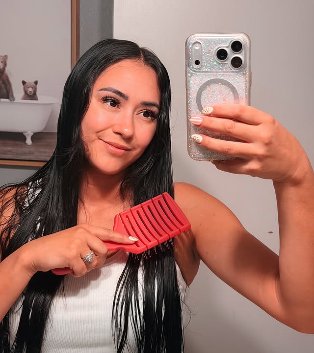 Instagram post by @ashstach_reviews for Wet Brush. Caption reads: I’m really loving the Wet Brush Pro Flex Paddle....