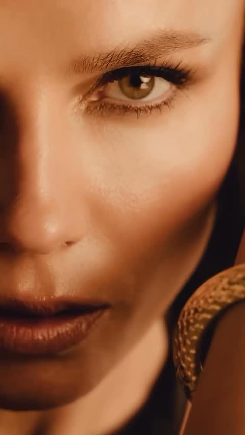 Instagram post by @natashapoly for Roberto Cavalli. Caption reads: [...] ✨ Serpentine
@roberto_cavalli....