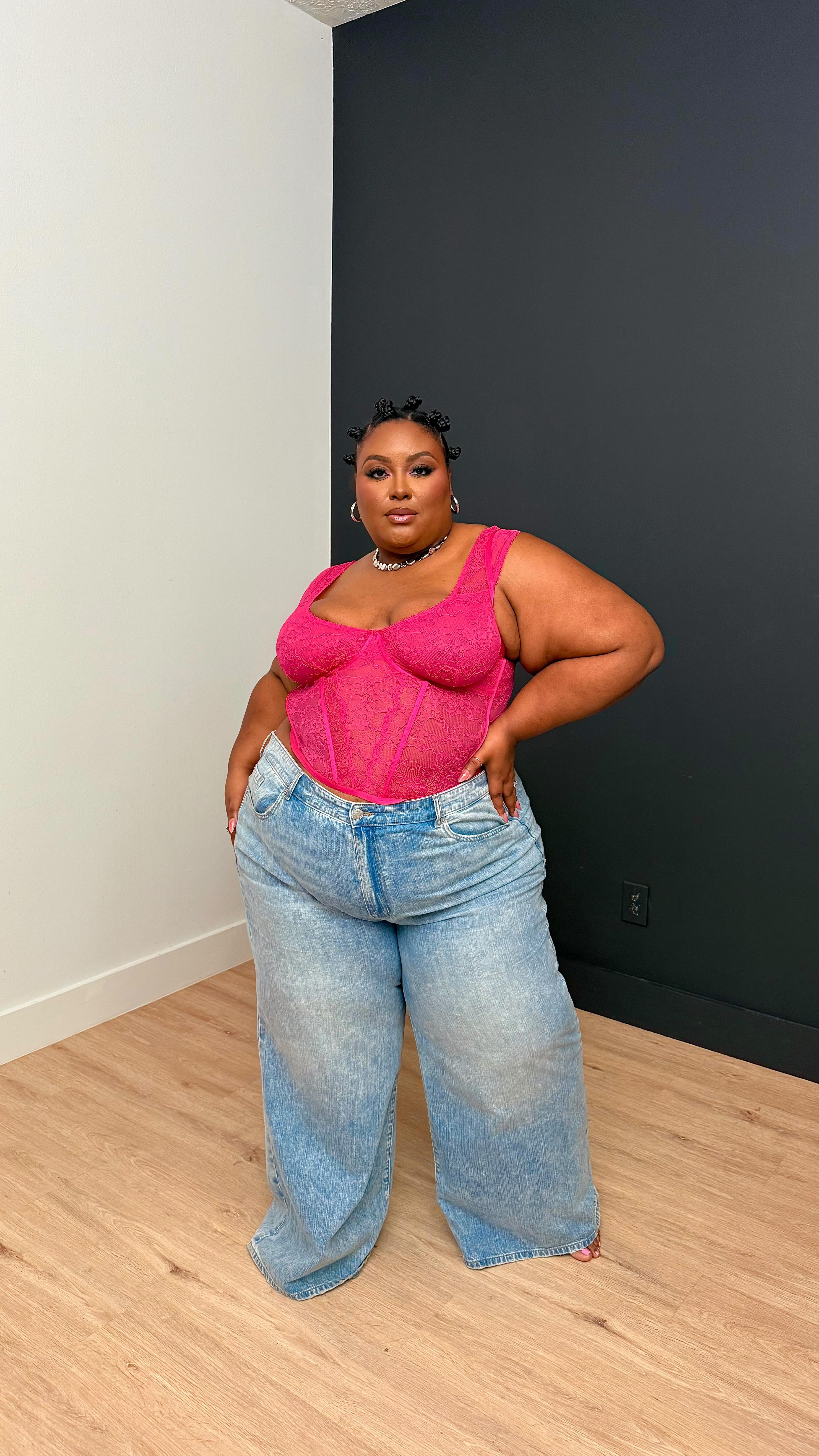 Instagram post by @morgiemone for Torrid. Caption reads: #TorridPartner Jeans have become a forever....
