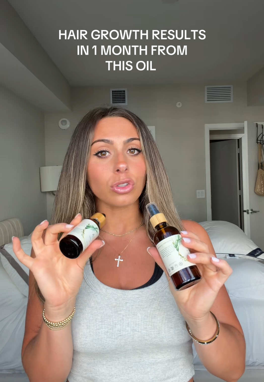 TikTok post by @arianavitale for LIA Organics. Caption reads: [...] #hairtok #hairoiling @LIA Organics.