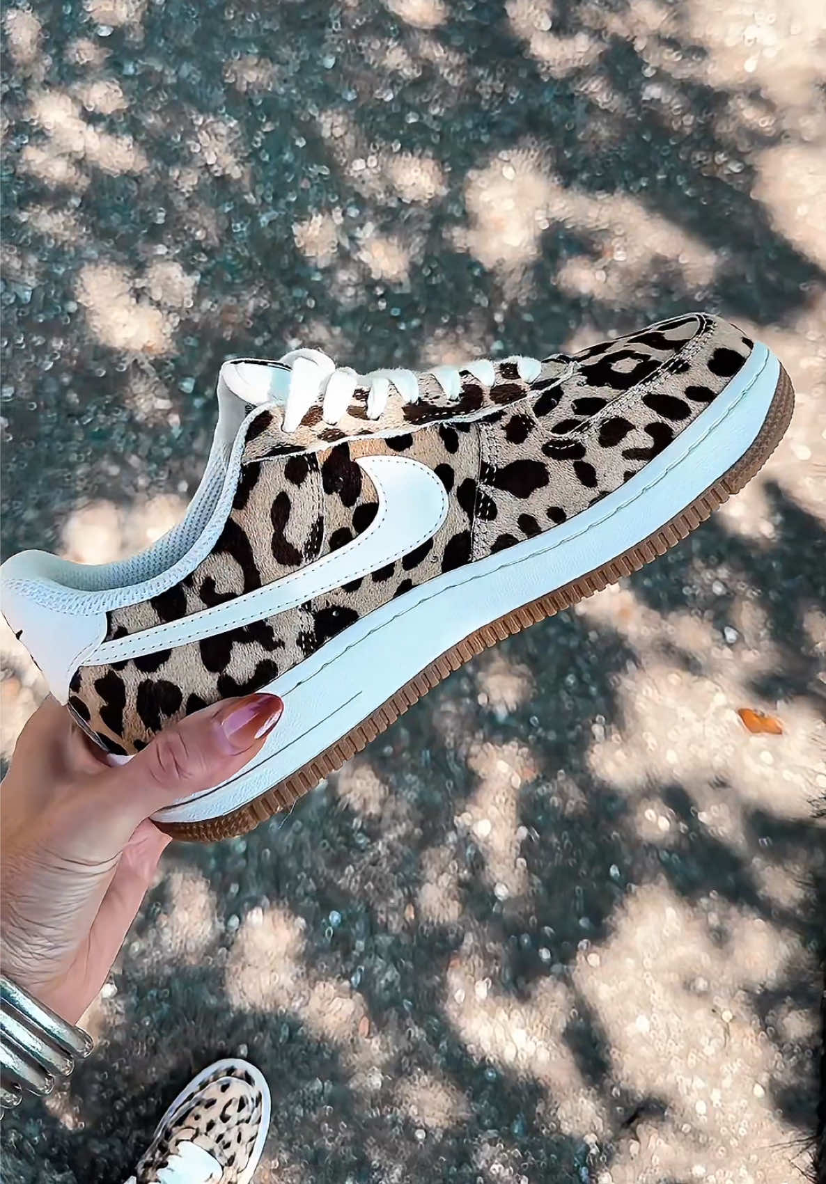 TikTok post by @adrianegweyn for Fly Kicks. Caption reads: [...] #SneakerGirlies #FallSneakers @Fly Kicks.