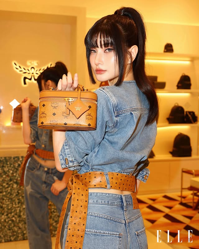 Instagram post by @mable_siriwalee for MCM. Caption reads: 🧡🩶 #ELLEFashionFever #EFFatICONSIAM #MCMThailand....