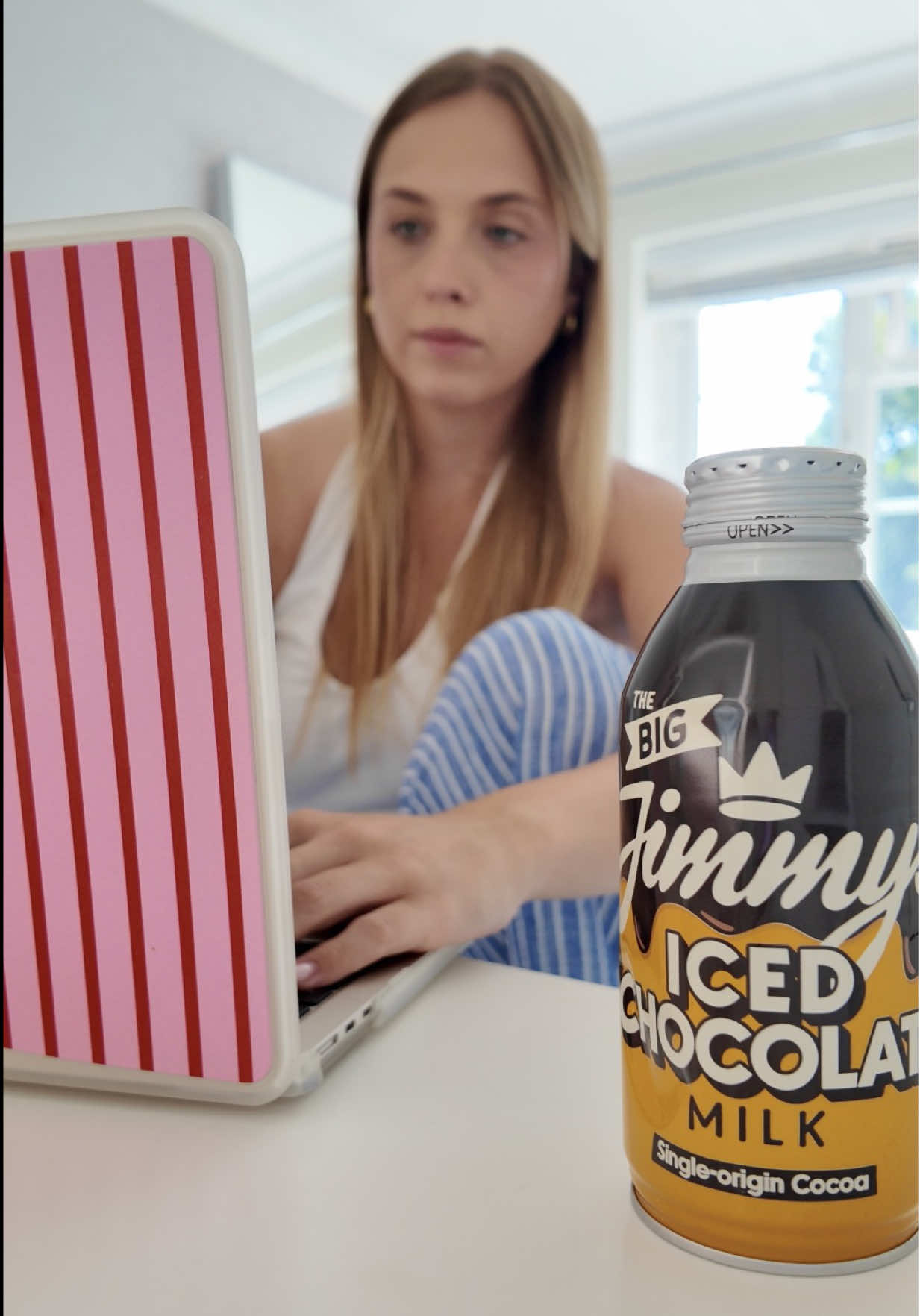 TikTok post by @georgiachurchill for Jimmy's Iced Coffee. Caption reads: What’s your afternoon pick-me-up? 👀 Jimmys first....