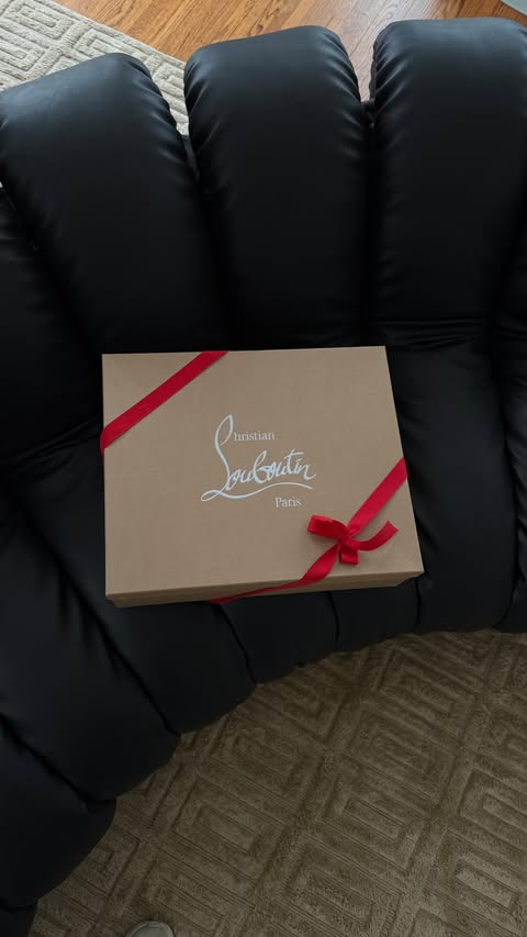 Instagram post by @tayhage for Christian Louboutin. Caption reads: Unboxing my new boots for winter…not winter boots.....