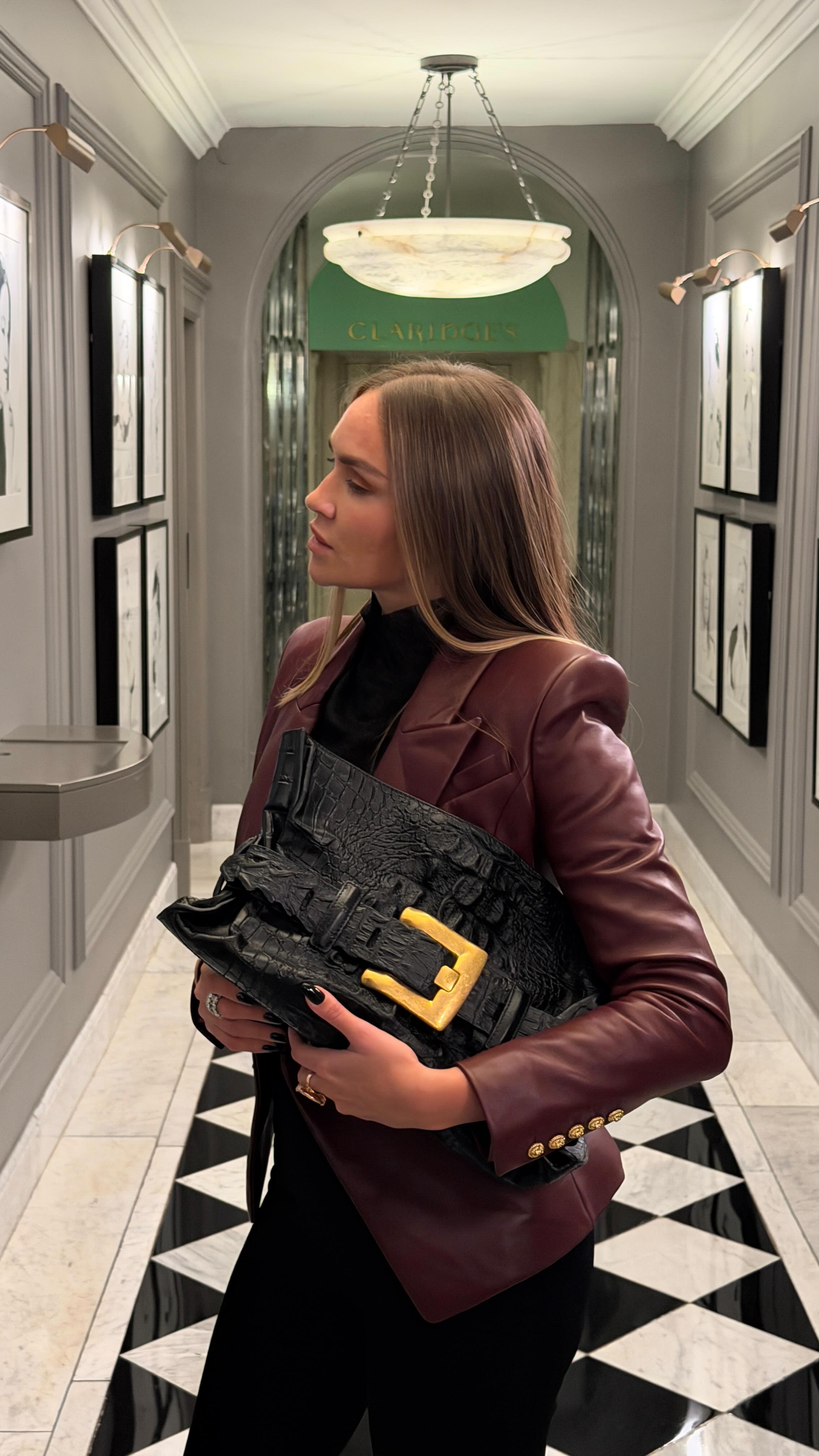 Instagram post by @ninasuess for Balmain. Caption reads: #GRWM for a festive Dinner with @balmain and....