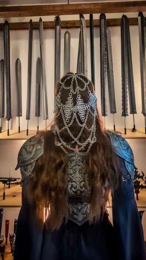 Instagram post by @thescarletthuntress for HolyClothing. Caption reads: Am I missing anything? 🗡️ Dress kindly gifted by....