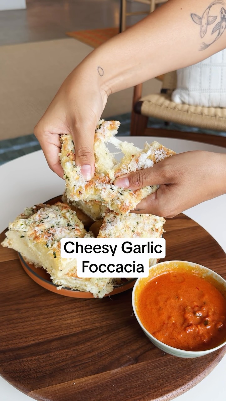 Instagram post by @thepastryboxbakery for Food52. Caption reads: What’s better than cheesy focaccia? Cheesy,....