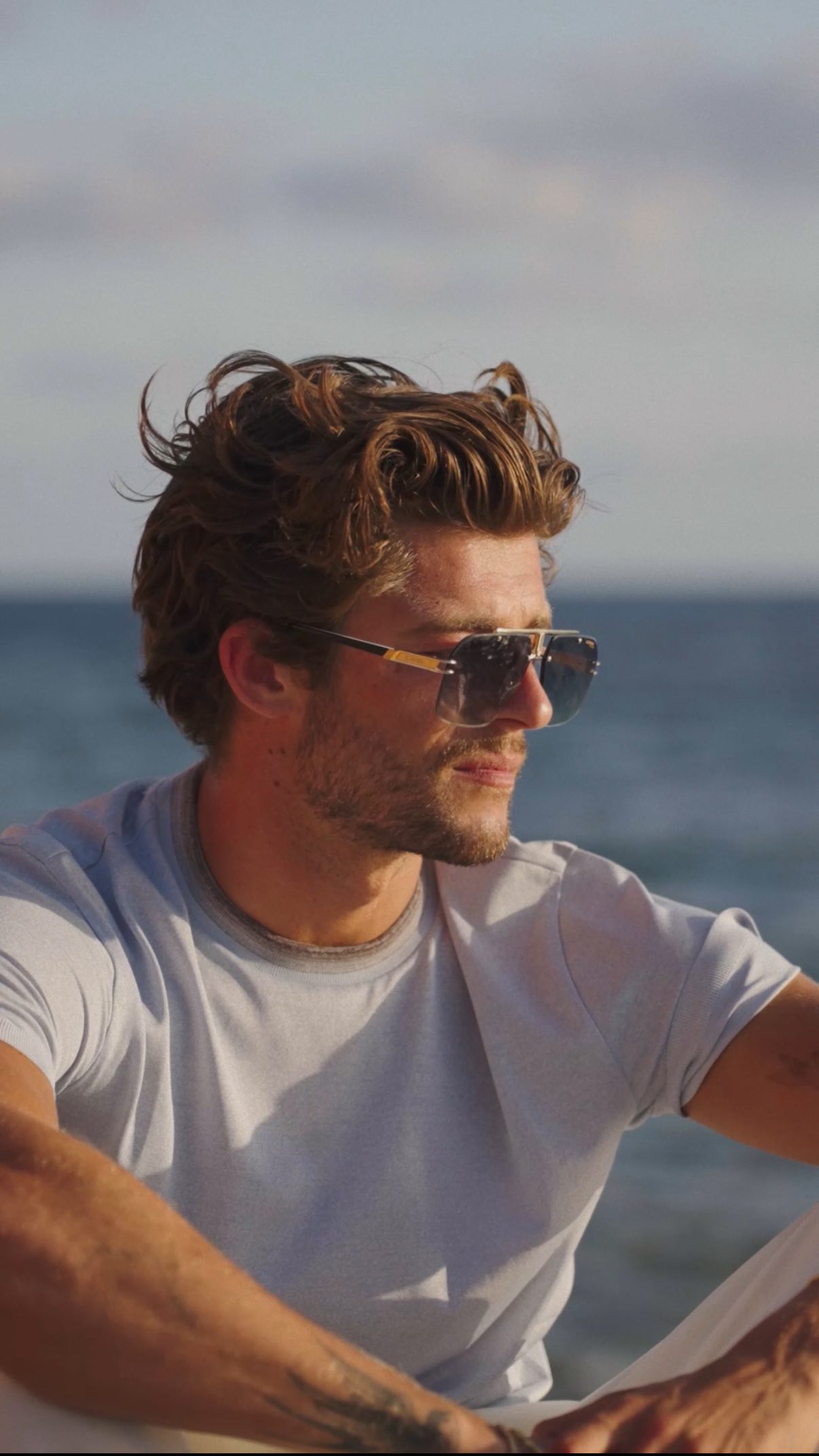 Instagram post by @sammsalter for Carrera Eyewear. Caption reads: AD @carrera summer shades, your staple item this....