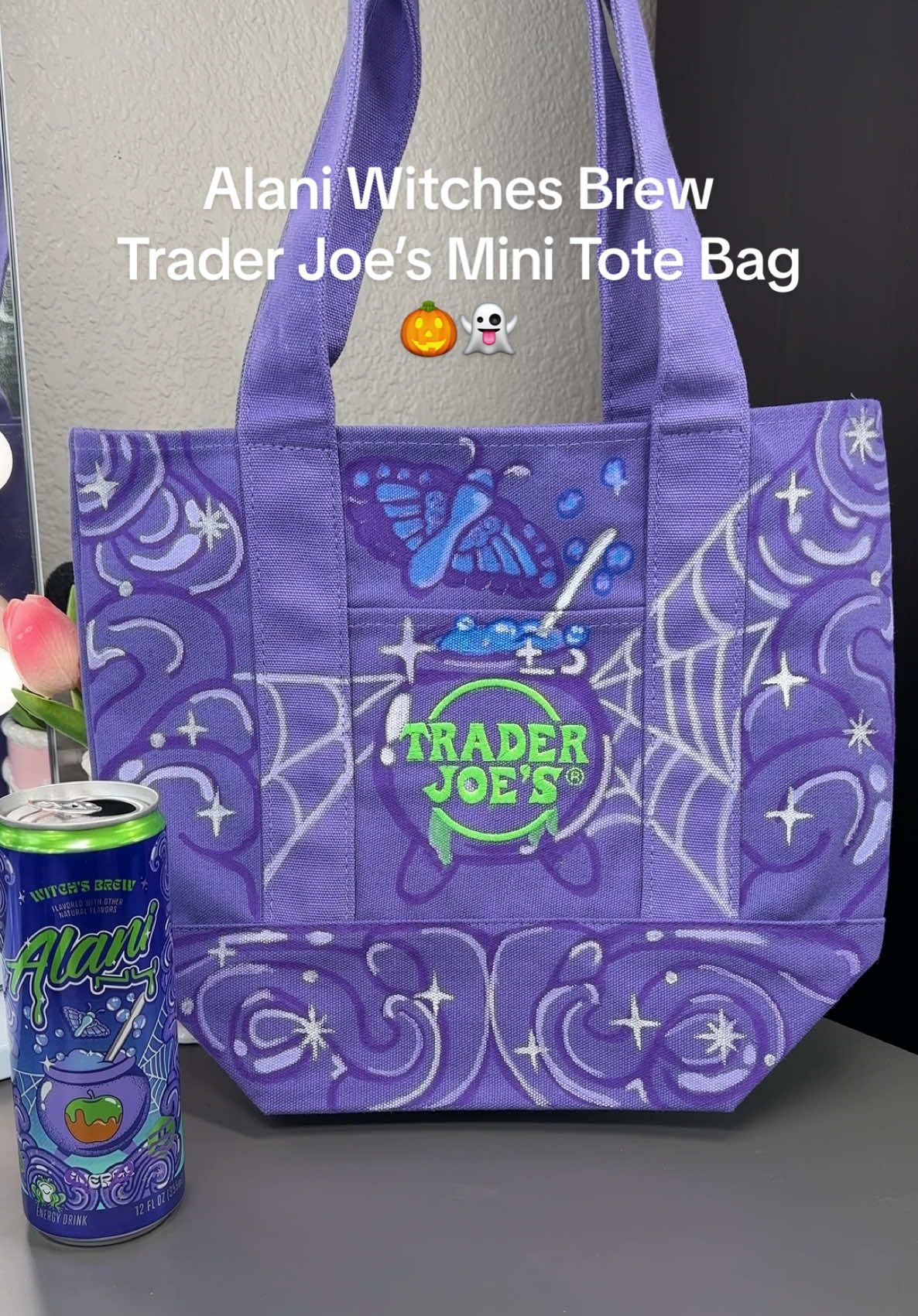 TikTok post by @vanessa.h.lopez for Alani Nutrition. Caption reads: Trader Joe’s Halloween Mini canvas tote bags 🎃👻....