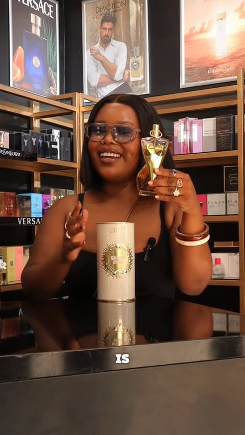 Instagram post by @_natalieie for The Perfume Shop. Caption reads: [...] Happy Women’s Month from me and....