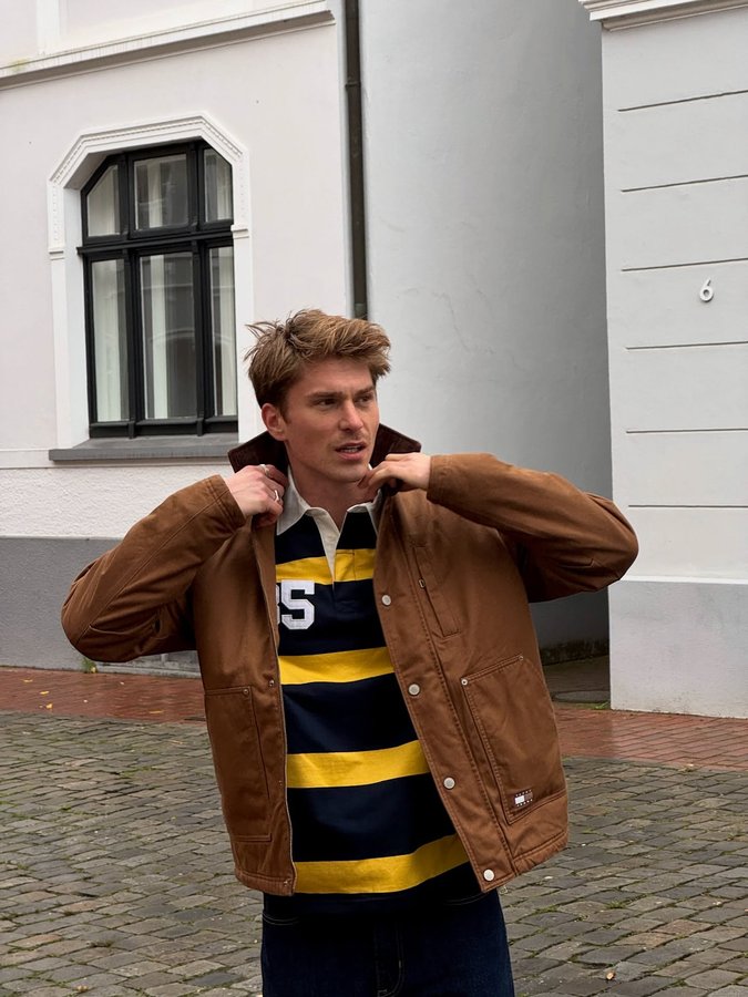 Instagram post by @philsoda for Tommy Jeans. Caption reads: Fall is better in @tommyjeans 🍁| ad.