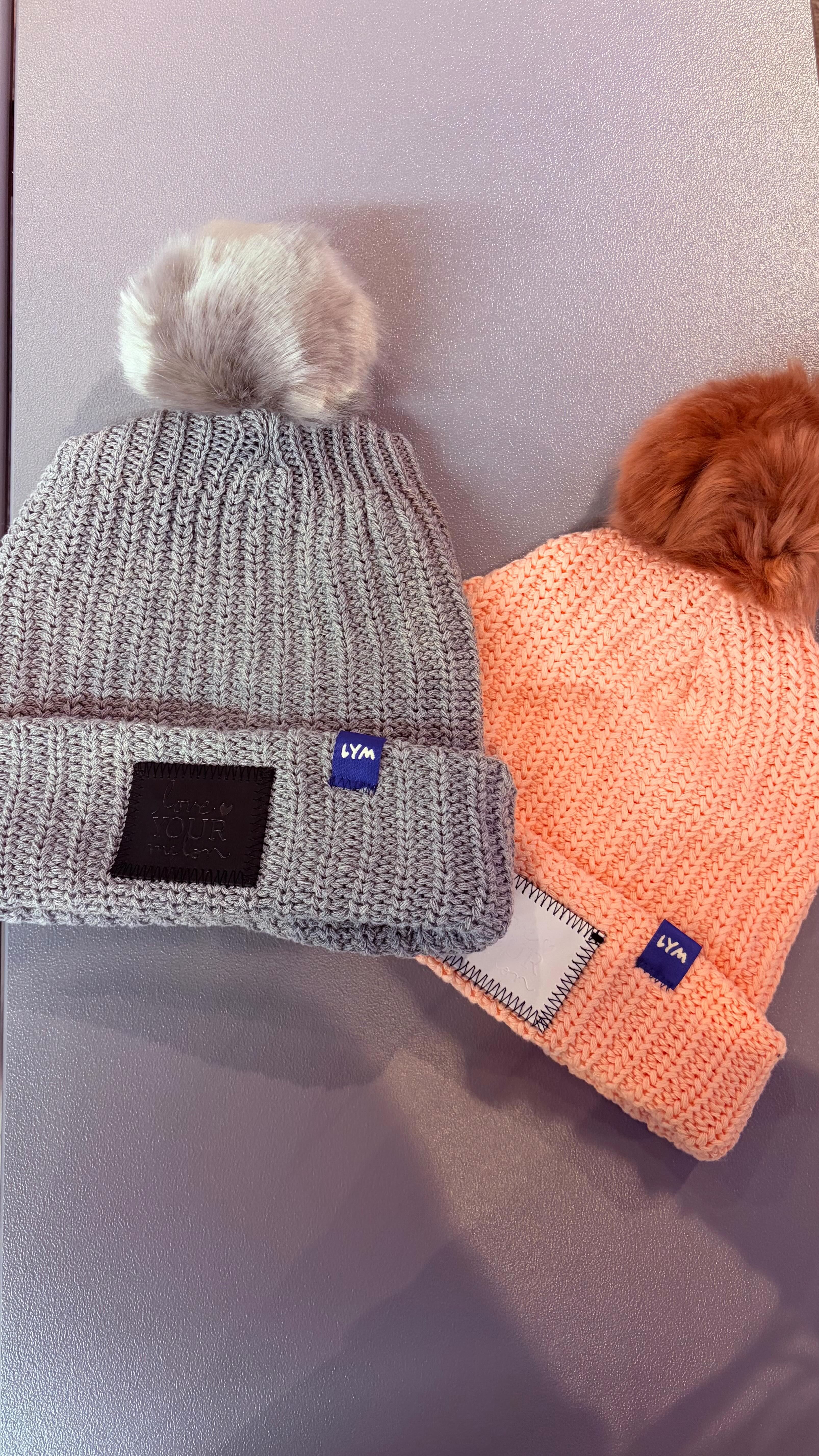 Instagram post by @buildyourownbeanie for Love Your Melon. Caption reads: Double the beanies, double the cozy 🩶🩷 #lym....