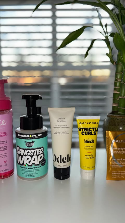 Instagram post by @izzylopresti for Curls Monthly. Caption reads: Just a girl obsessed with her @curlsmonthly box....