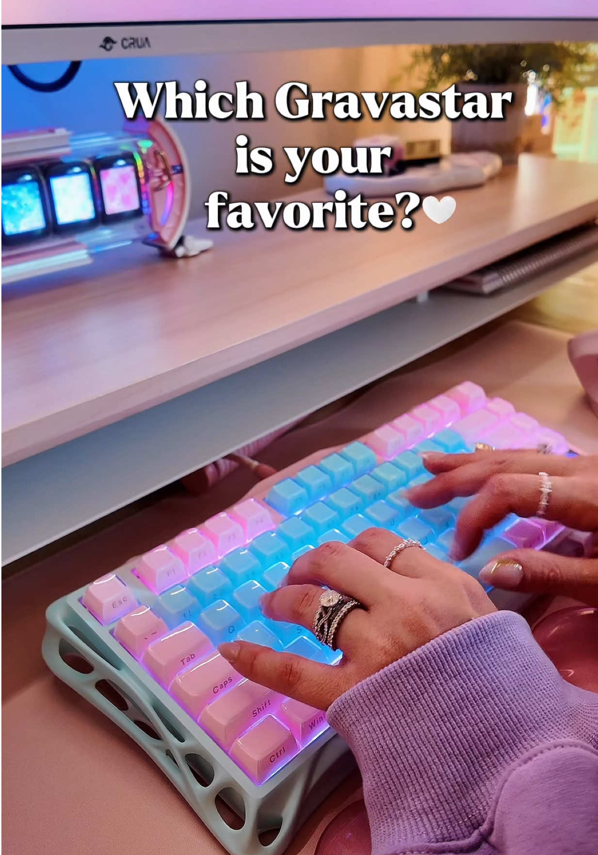TikTok post by an influencer for GravaStar. Caption reads: I love love love my gravastar keyboards and could....