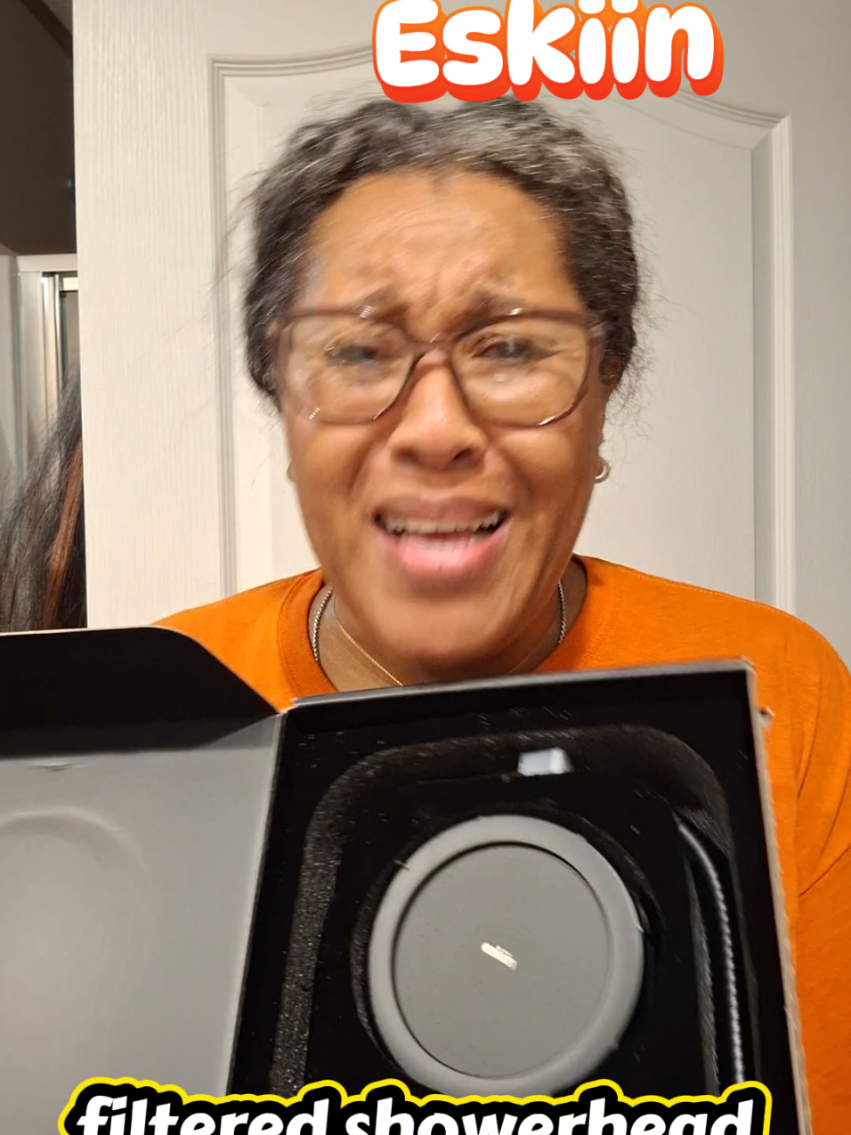 TikTok post by @lowandadavis2 for Eskiin. Caption reads: @eskiin filtered showerhead 🔥🔥🔥💯🔥💯 [...].