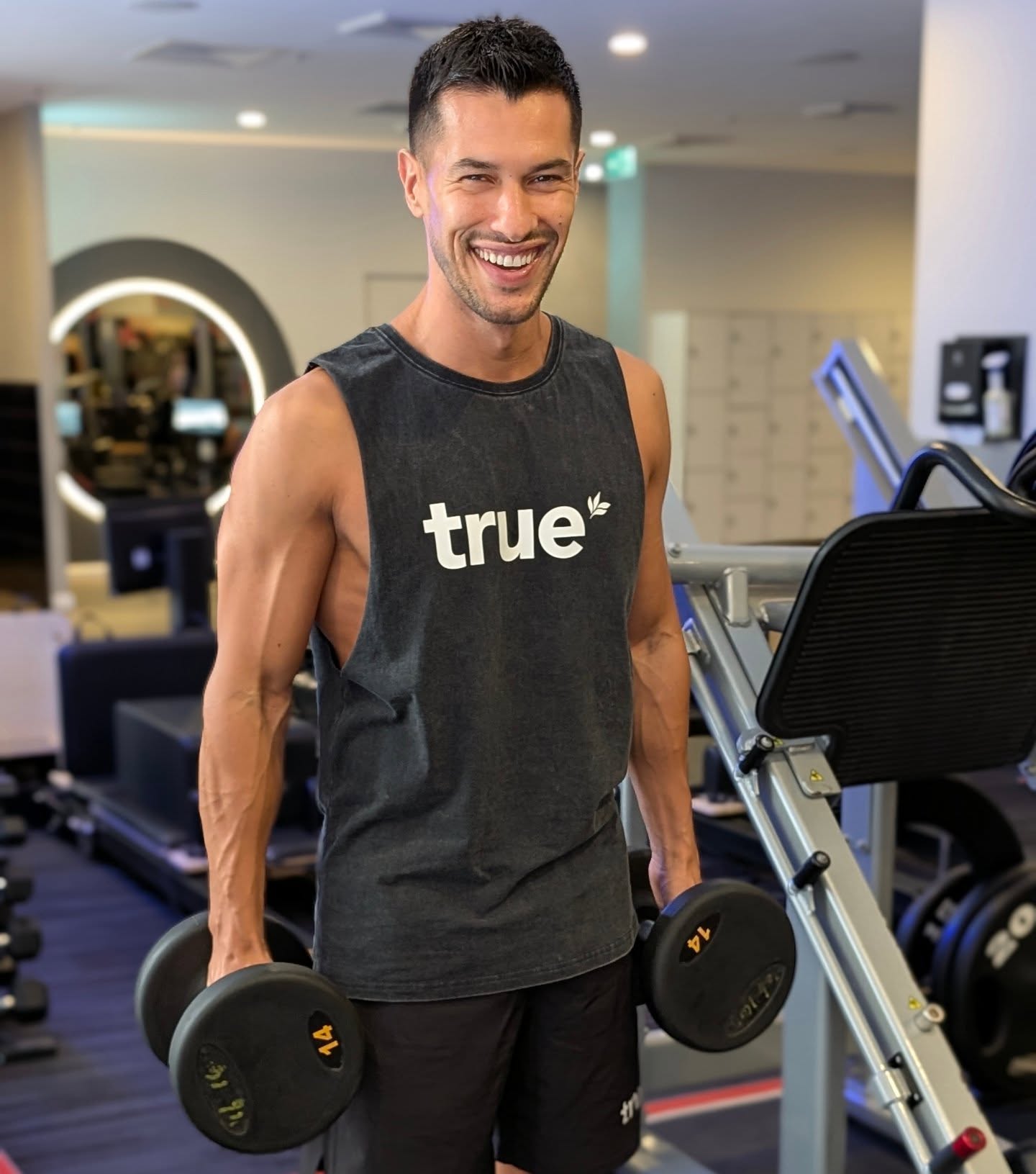 Instagram post by @rudyelkholti for True Protein. Caption reads: Train hard, smile harder 😁💪

Because progress....