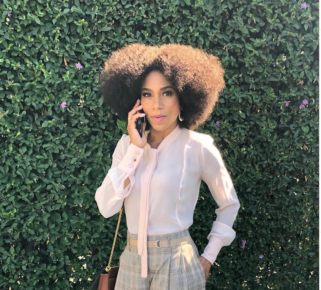 Instagram post by @seekellymccreary for Carol's Daughter. Caption reads: Learning to love my hair wasn’t always easy.....