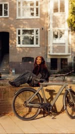 Instagram post by @crackmagazine for VanMoof. Caption reads: @ri.mon knows a place 🌍⁠
⁠
“I adore the pace....