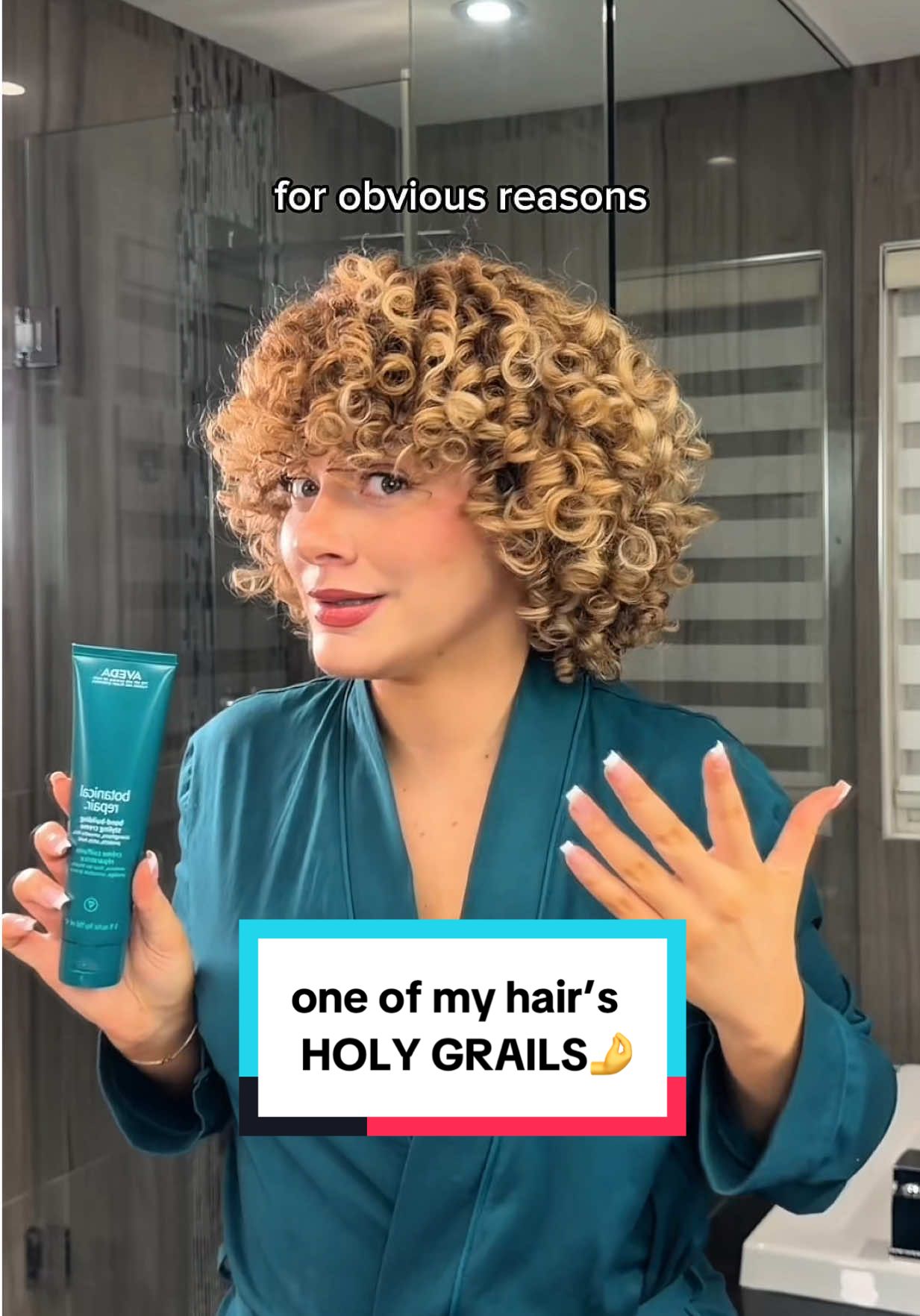 TikTok post by @manesbymell for Aveda. Caption reads: Just me, an island, and @Aveda Botanical Repair....