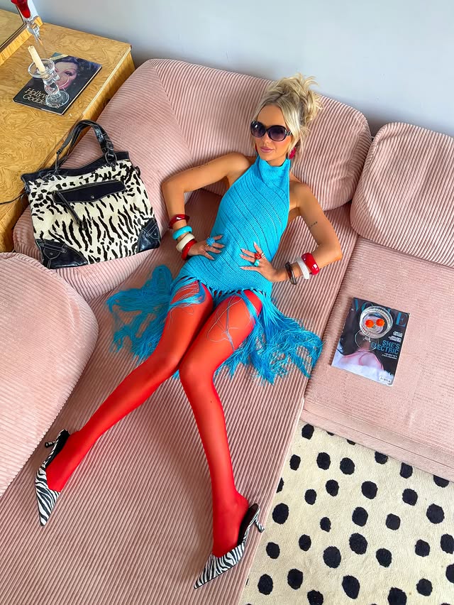 Instagram post by @amyhallimond for OMHU. Caption reads: the sofa has a dress code👄🍸👑🦓👗👠 @omhu_cph ⭐️....