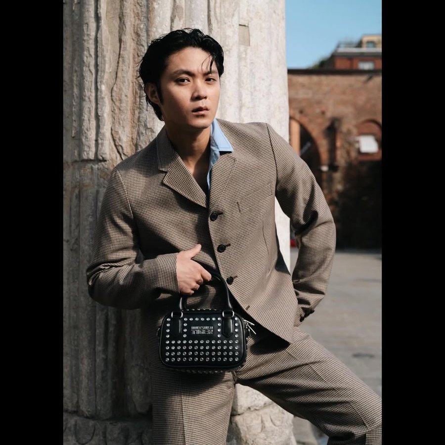 Instagram post by @hayato_isomura for Onitsuka Tiger. Caption reads: .

Esquire × OnitsukaTiger

Urban Duality in....