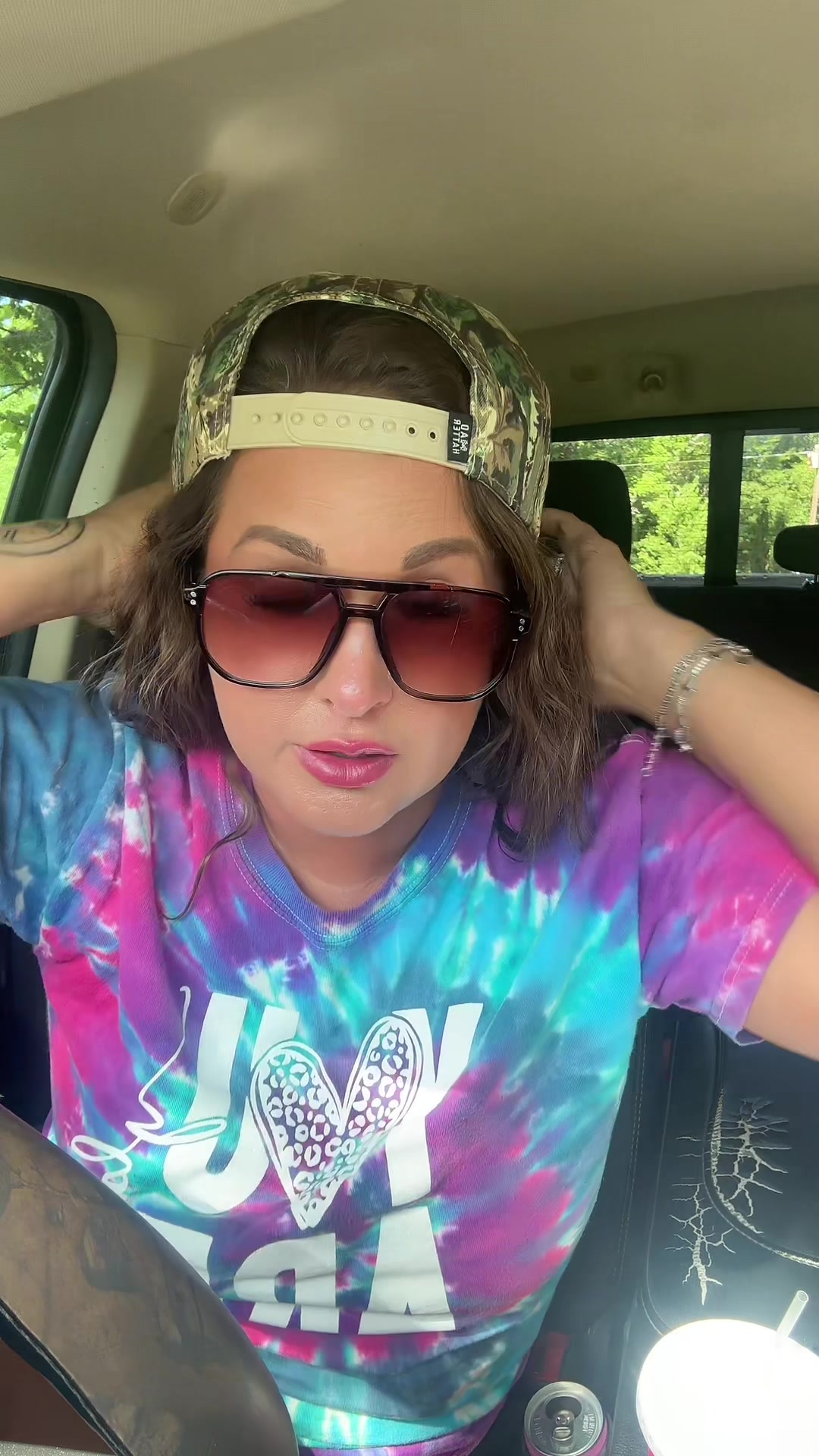 TikTok post by @brittanykennedy1231 for The Mad Hatter Company. Caption reads: [...] #camohat #deerseason #ballcap @The Mad....
