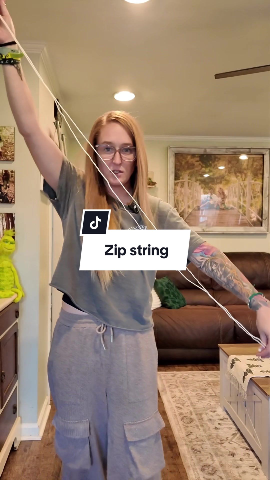 TikTok post by @authenticallythrive for ZipString. Caption reads: I need five @ZipString . #zipstring....