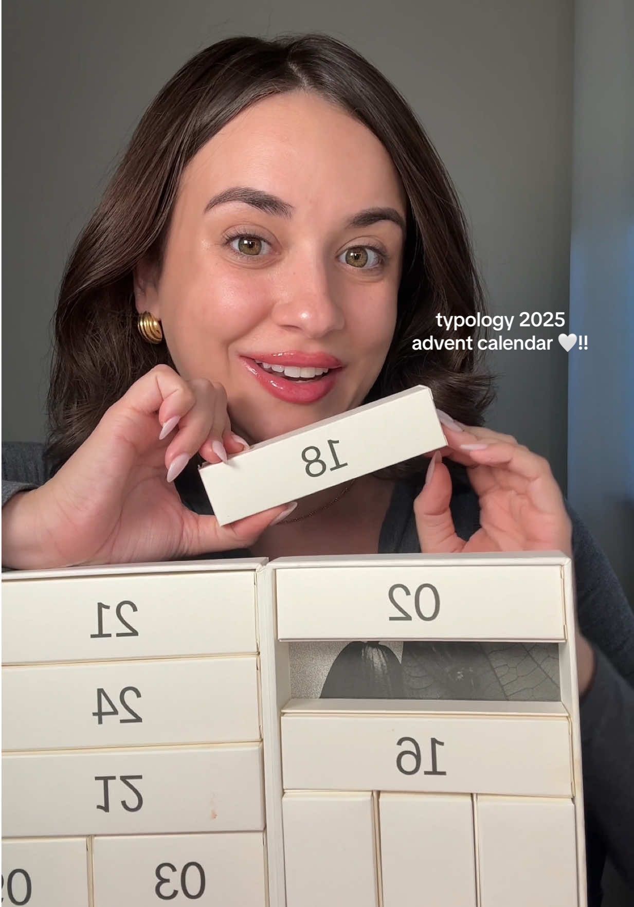 TikTok post by @gabymariie5 for Typology. Caption reads: unboxing the 2025 typology advent calendar✨it....